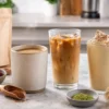 Hot, iced and blended mushroom coffee drinks arranged together